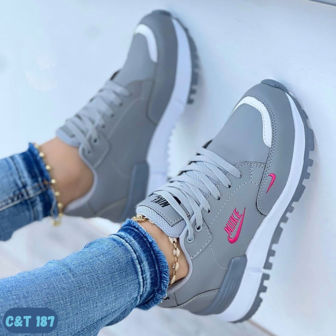 NIKE TREBOL GRISES (C&T 187)