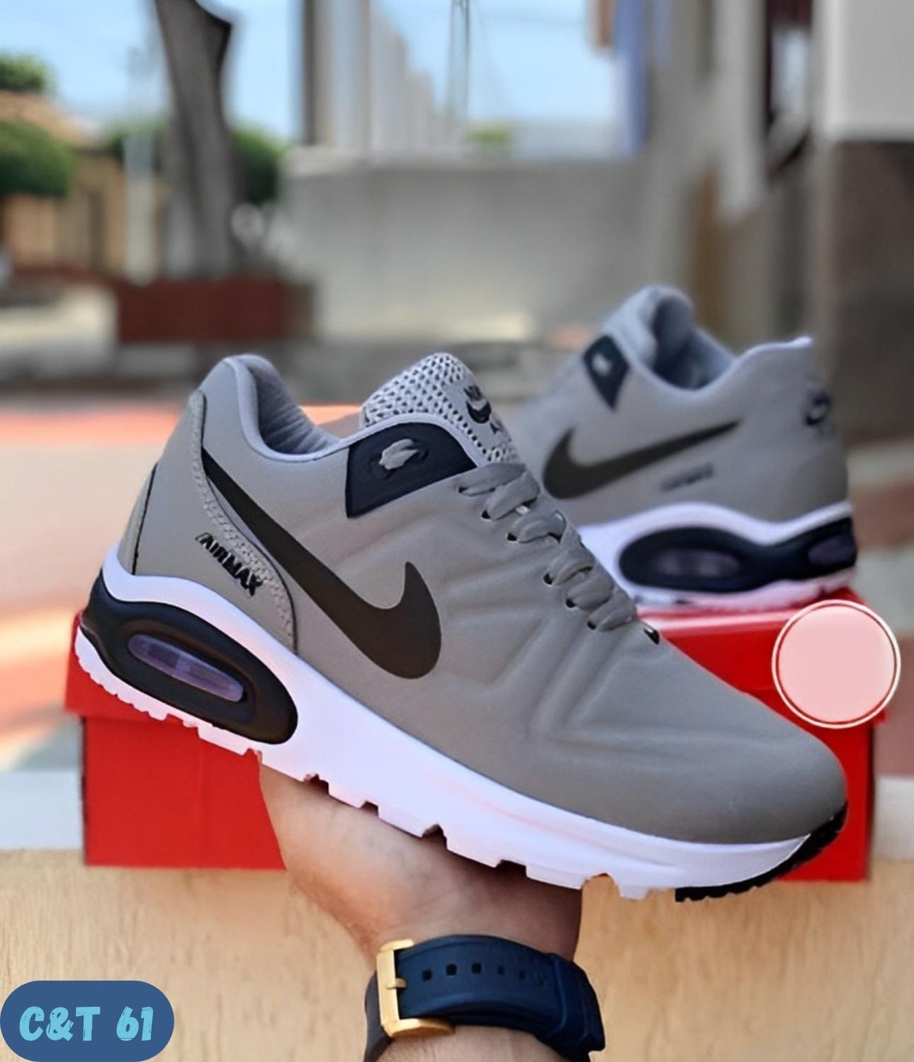 NIKE COMANDO GRISES (C&T 61)